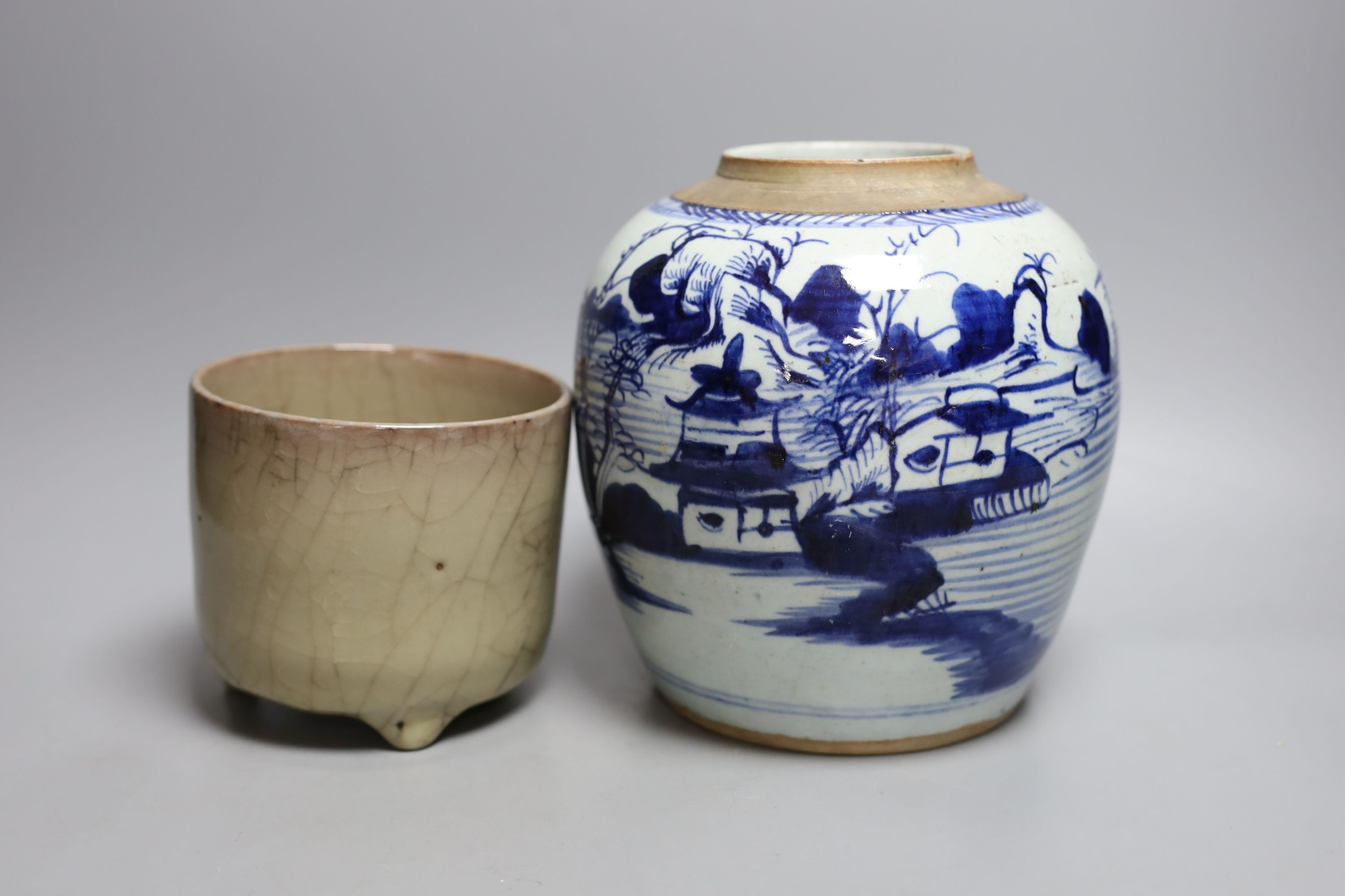 A 19th century Chinese blue and white jar depicting a village scene, together with a Chinese crackle glaze tripod censer - tallest 19cm